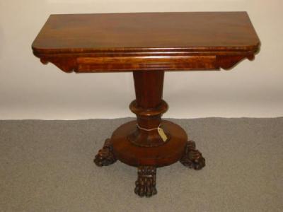 Appraisal: A VICTORIAN MAHOGANY FOLDING TEA TABLE of rounded oblong form