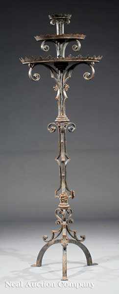 Appraisal: A Renaissance-Style Wrought Iron Torch re tiered top scrolled standard