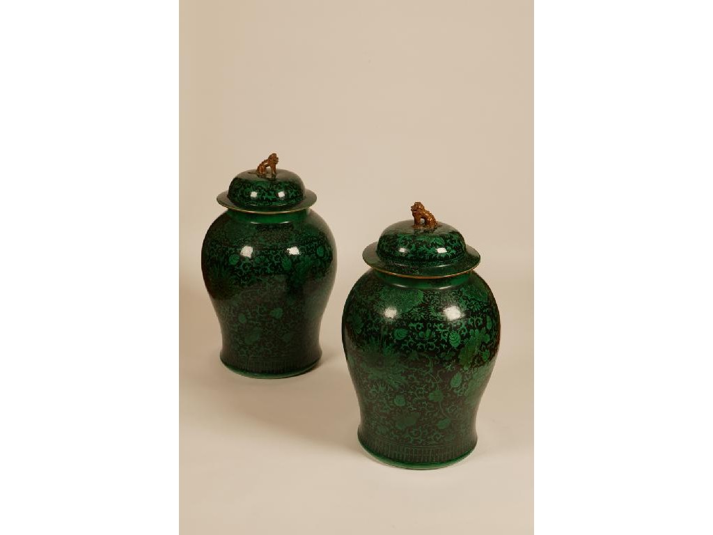 Appraisal: A PAIR OF CHINESE VASES AND COVERS of baluster form