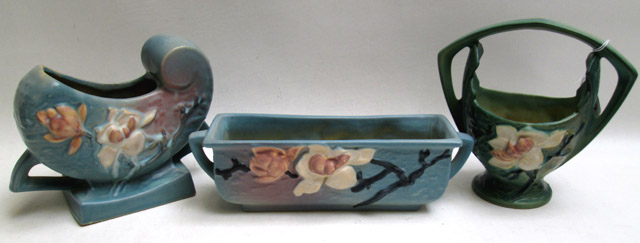 Appraisal: THREE ROSEVILLE POTTERY VESSELS in the Magnolia pattern planter -