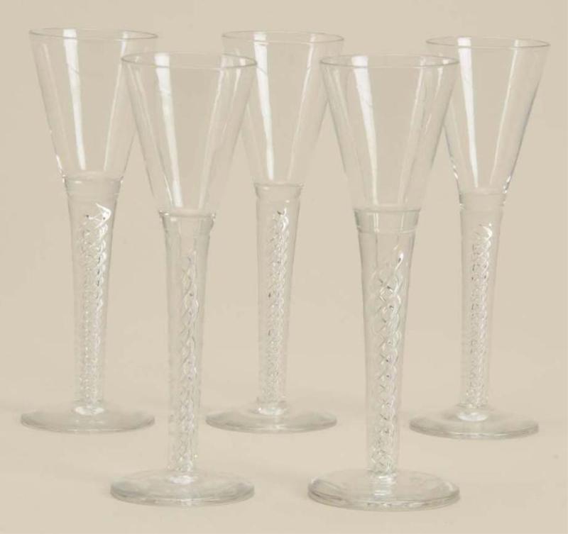 Appraisal: Lot of Colorless Glass Air Twist Wine Flutes Description Glassware