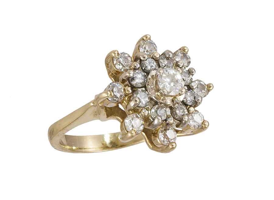 Appraisal: DIAMOND CLUSTER RING K yellow gold ring contains round single