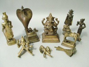 Appraisal: An Indian cast bronze model of Ganesh on a square