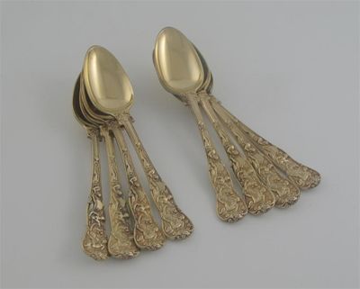 Appraisal: A set of seven George IV silvergilt Bacchanalian pattern teaspoons