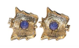 Appraisal: Pair of synthetic star sapphire and k yellow gold cuff