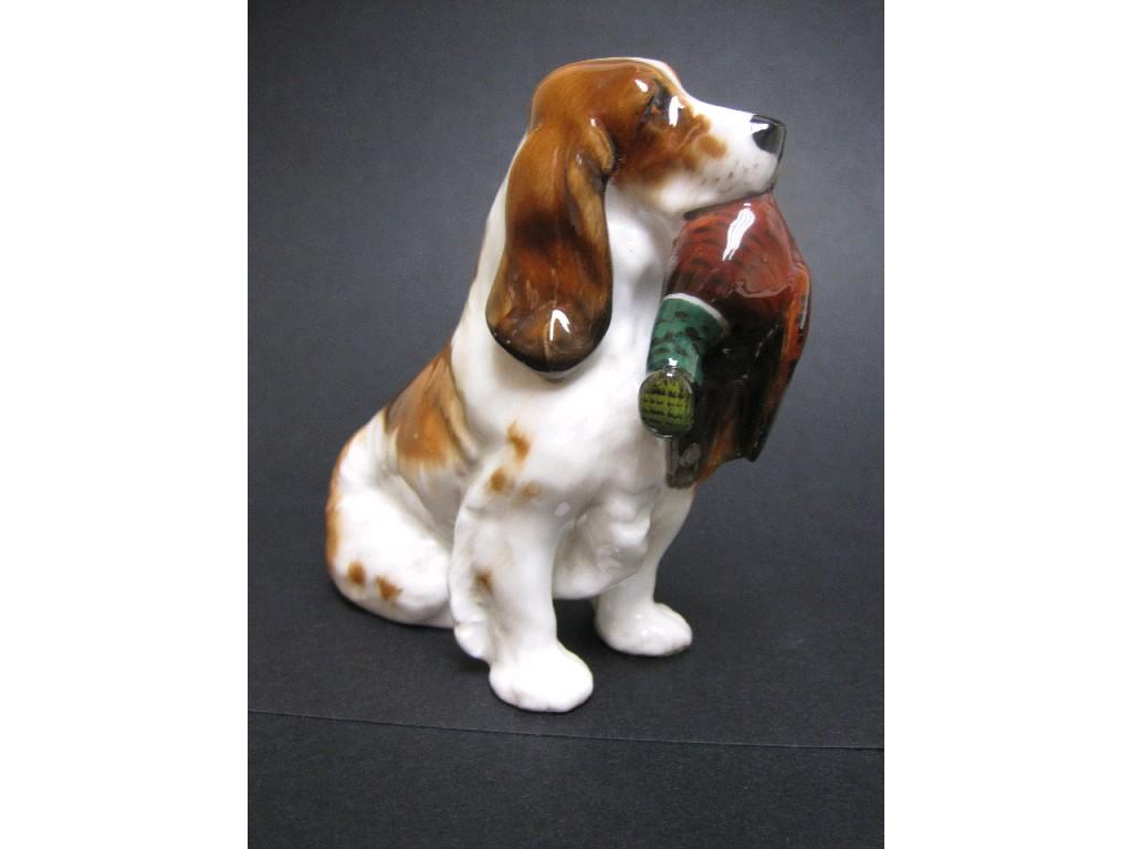 Appraisal: A Royal Doulton Spaniel with cock pheasant HN