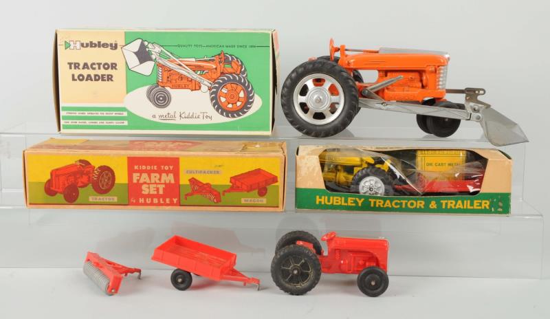 Appraisal: Lot Of Hubley Farming Vehicles With Boxes This lot includes