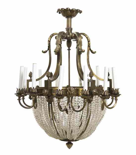 Appraisal: A French Gilt Bronze Eighteen-Light Chandelier having a foliate corona