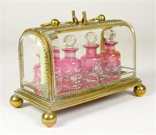 Appraisal: Perfume Tantalus with Enameled Cranberry Bottles Glass and gilt metal