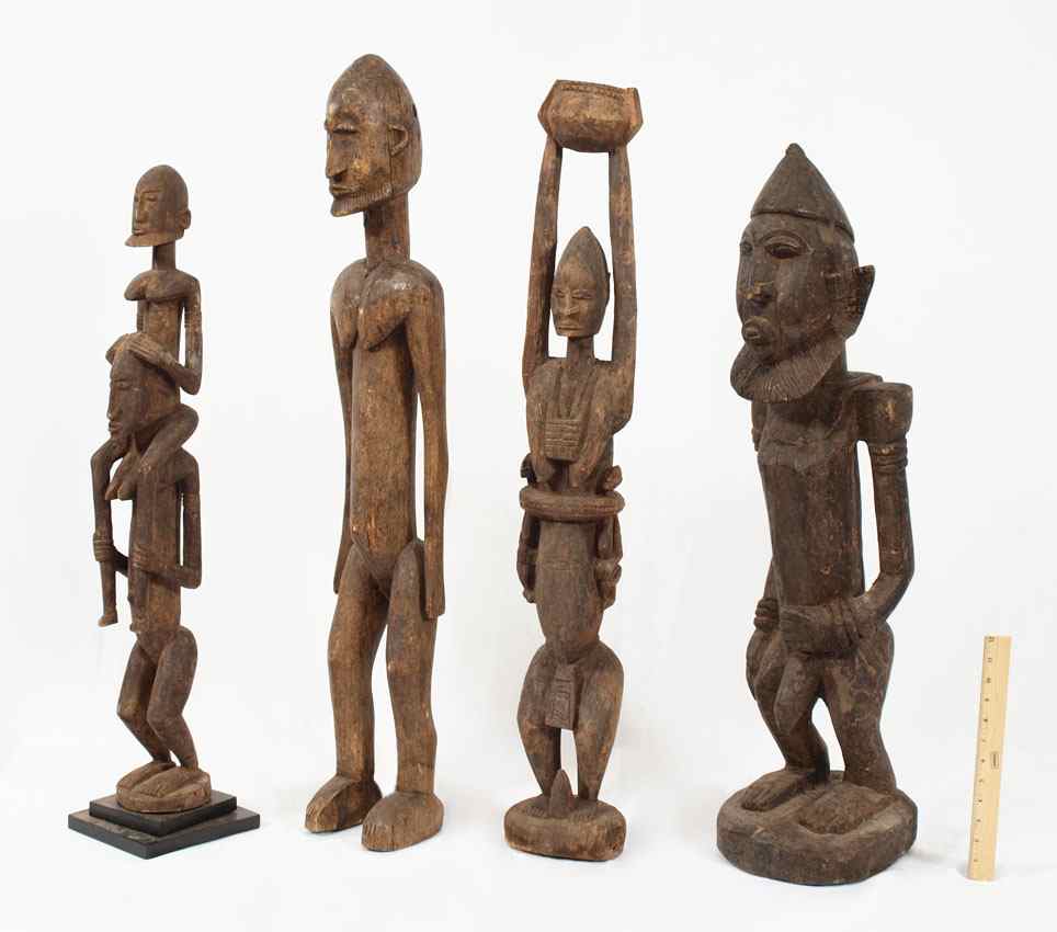 Appraisal: LARGE CARVED AFRICAN DOGON FIGURES '' x '' x ''