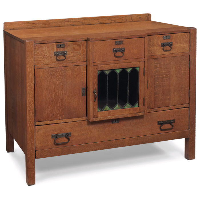 Appraisal: Arts and Crafts sideboard series of doors and drawers with