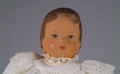 Appraisal: GERMAN PAINTED CLOTH HEAD DOLL This young lady with a