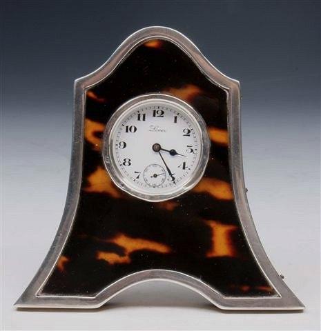 Appraisal: A SILVER AND TORTOISESHELL DESK CLOCK Chester high