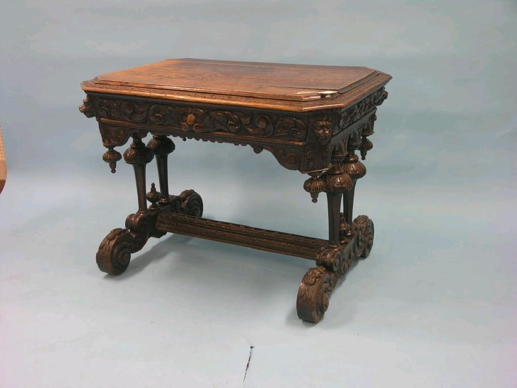 Appraisal: A late Victorian oak writing table in Flemish style rectangular