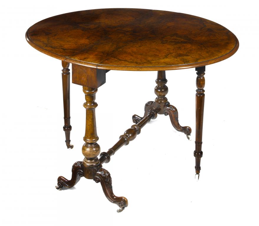 Appraisal: A VICTORIAN WALNUT SUTHERLAND TABLE the 'butterfly' veneered oval top