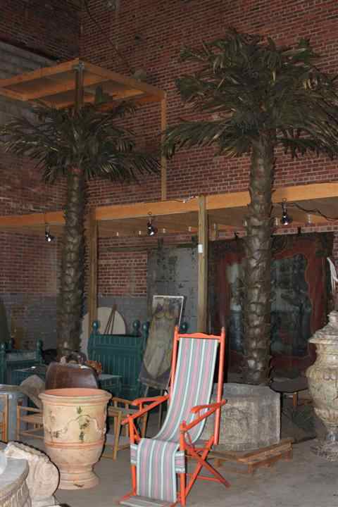 Appraisal: MASSIVE PAIR OF FAUX PALM TREES painted palm bark and