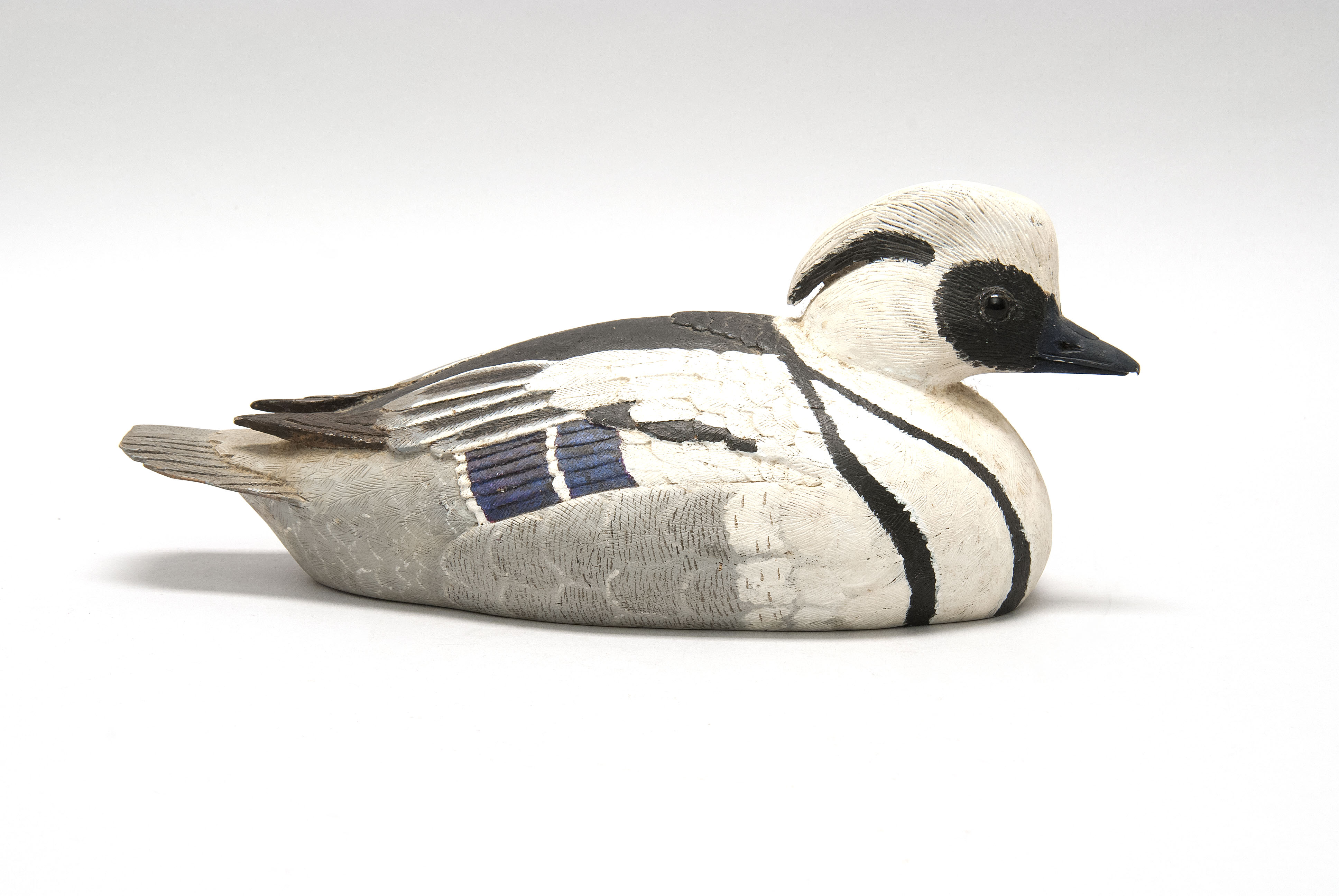 Appraisal: CARVED SMEW Signed on bottom Wilson E Ditty Small nick