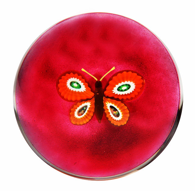 Appraisal: A PAUL YSART GLASS PAPERWEIGHT centrally decorated with an orange