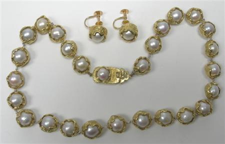 Appraisal: CHARLES DE TEMPLE - an ct gold mounted cultured pearl