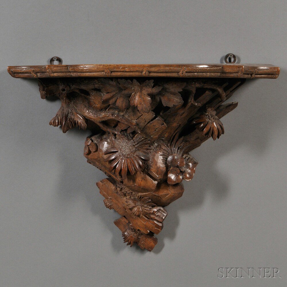 Appraisal: Swiss Carved Walnut Wall Bracket th century carved as a