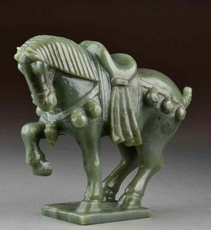 Appraisal: Chinese Qing Carved Celadon Jade HorseFinely carved to depict a