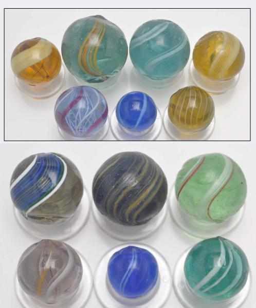 Appraisal: Lot of Handmade Marbles Description Includes seven banded transparents one