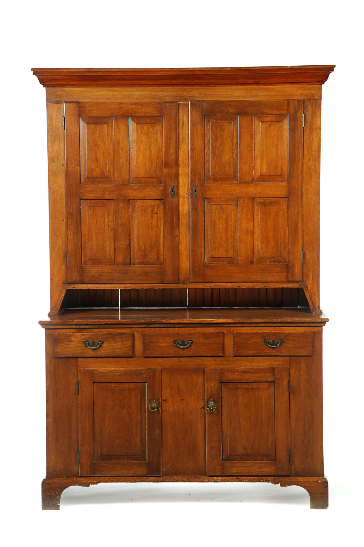 Appraisal: PENNSYLVANIA STEPBACK CUPBOARD Nineteenth century walnut or butternut Two-piece cupboard