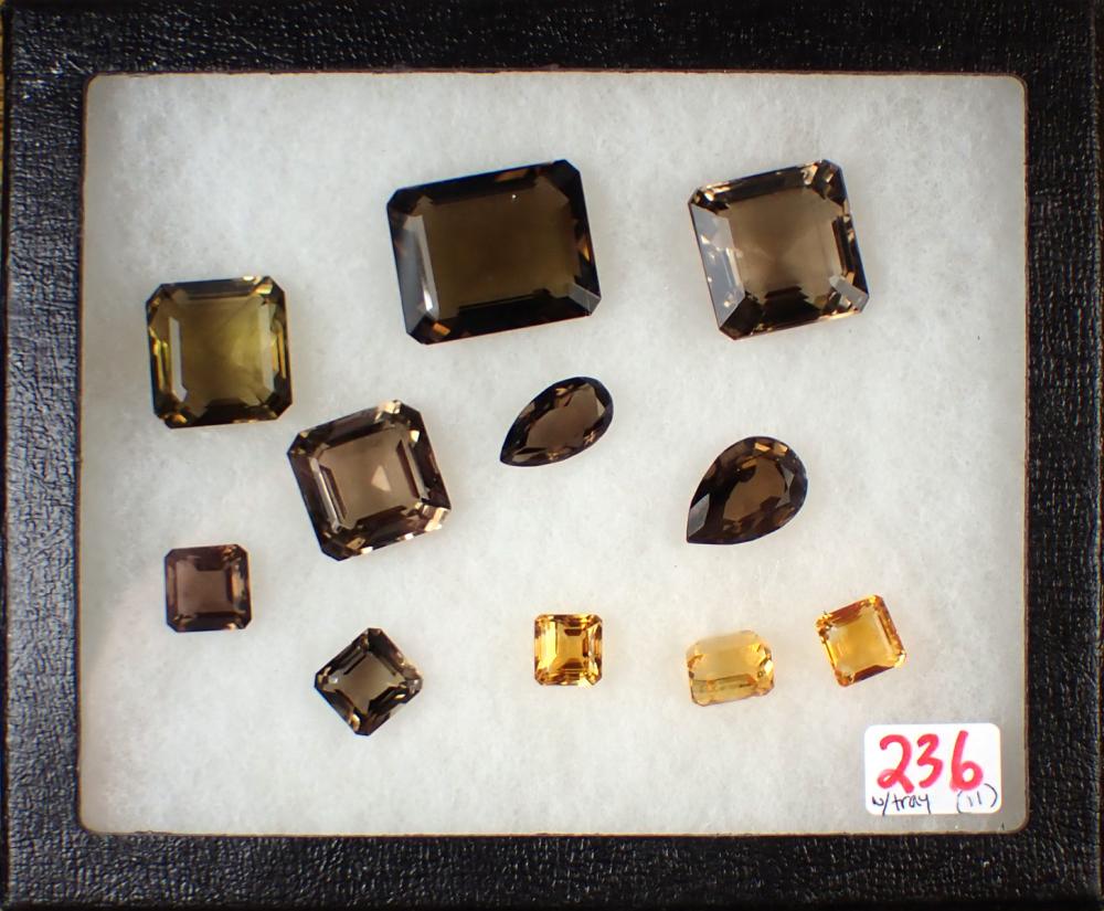 Appraisal: COLLECTION OF ELEVEN UNSET QUARTZ GEMSTONES including octagon step-cut smoky