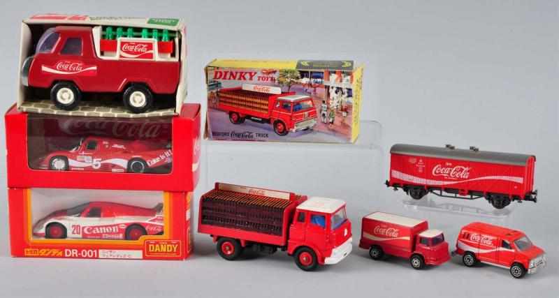 Appraisal: Lot of Assorted Coca-Cola Truck and Car Toys Description Circa