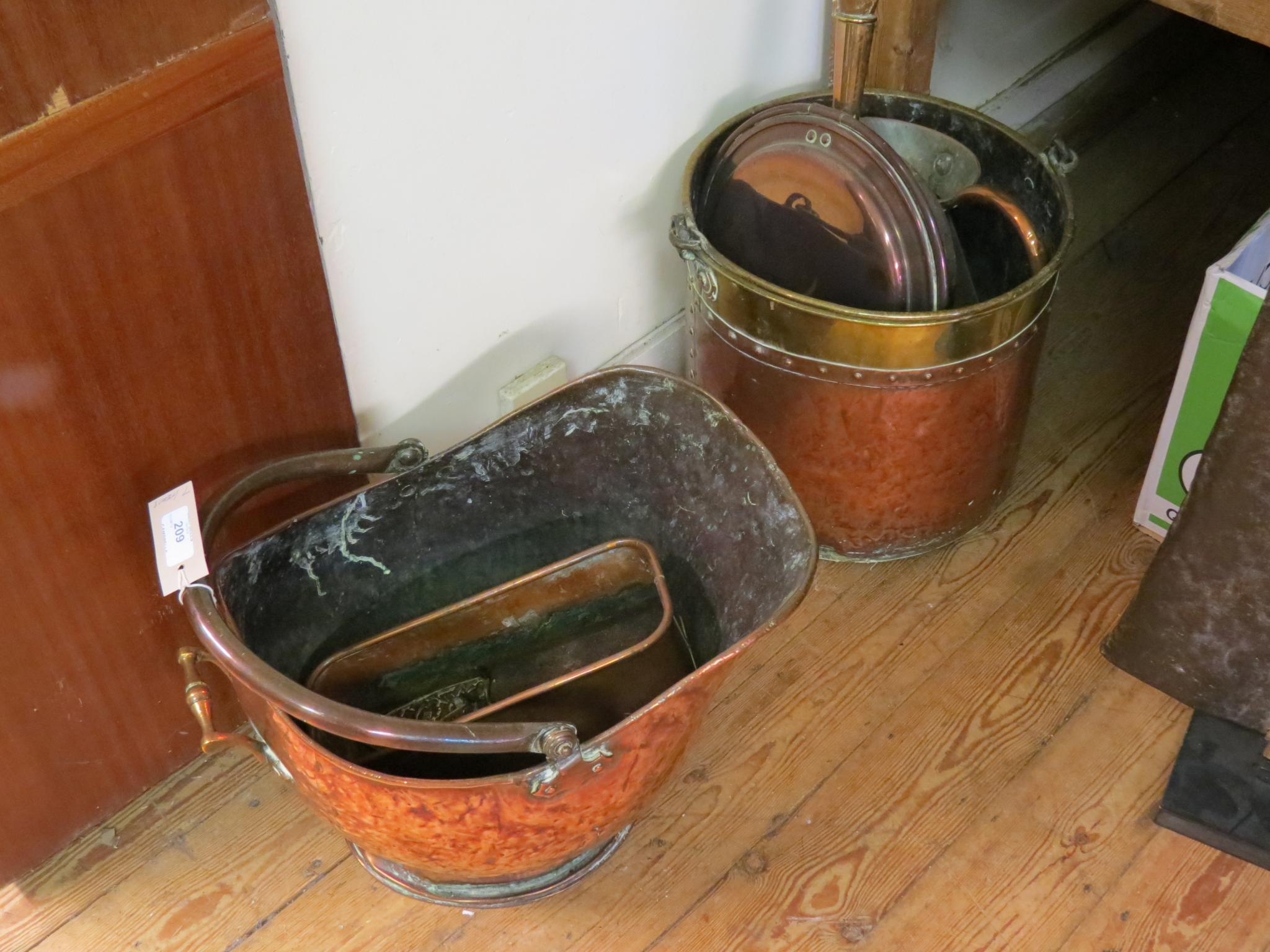 Appraisal: A Victorian copper helmet-shape coal scuttle cylindrical brass and copper