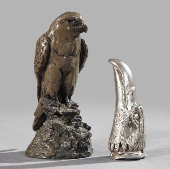 Appraisal: Two-Piece Group of Hawk Figures consisting of a Continental bronzed