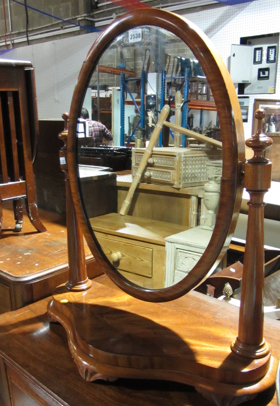 Appraisal: A th century mahogany oval swing frame toilet mirror