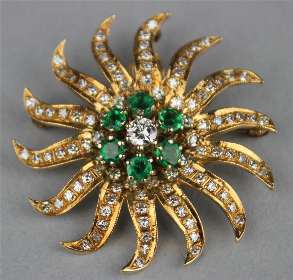 Appraisal: GALT'S K YELLOW GOLD DIAMOND AND EMERALD SUNBURST BROOCH the