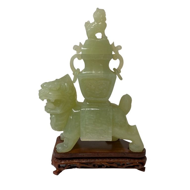 Appraisal: Chinese Jade Lion Statue on Wooden Stand Chinese Jade Lion