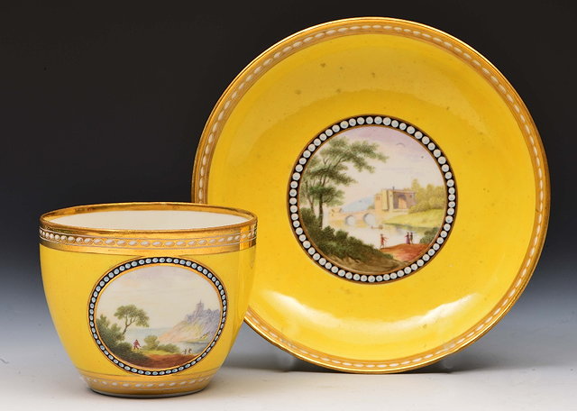 Appraisal: Derby yellow ground tea cup and saucercirca with puce crown