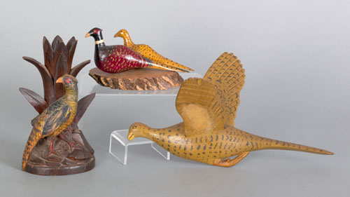 Appraisal: Carved miniature pheasants to include a Black Forest bud vase