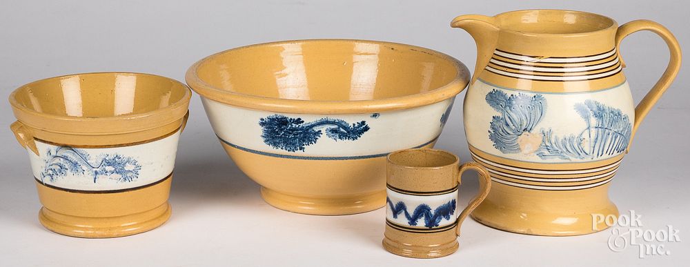 Appraisal: Four pieces of yellowware mocha th c Four pieces of