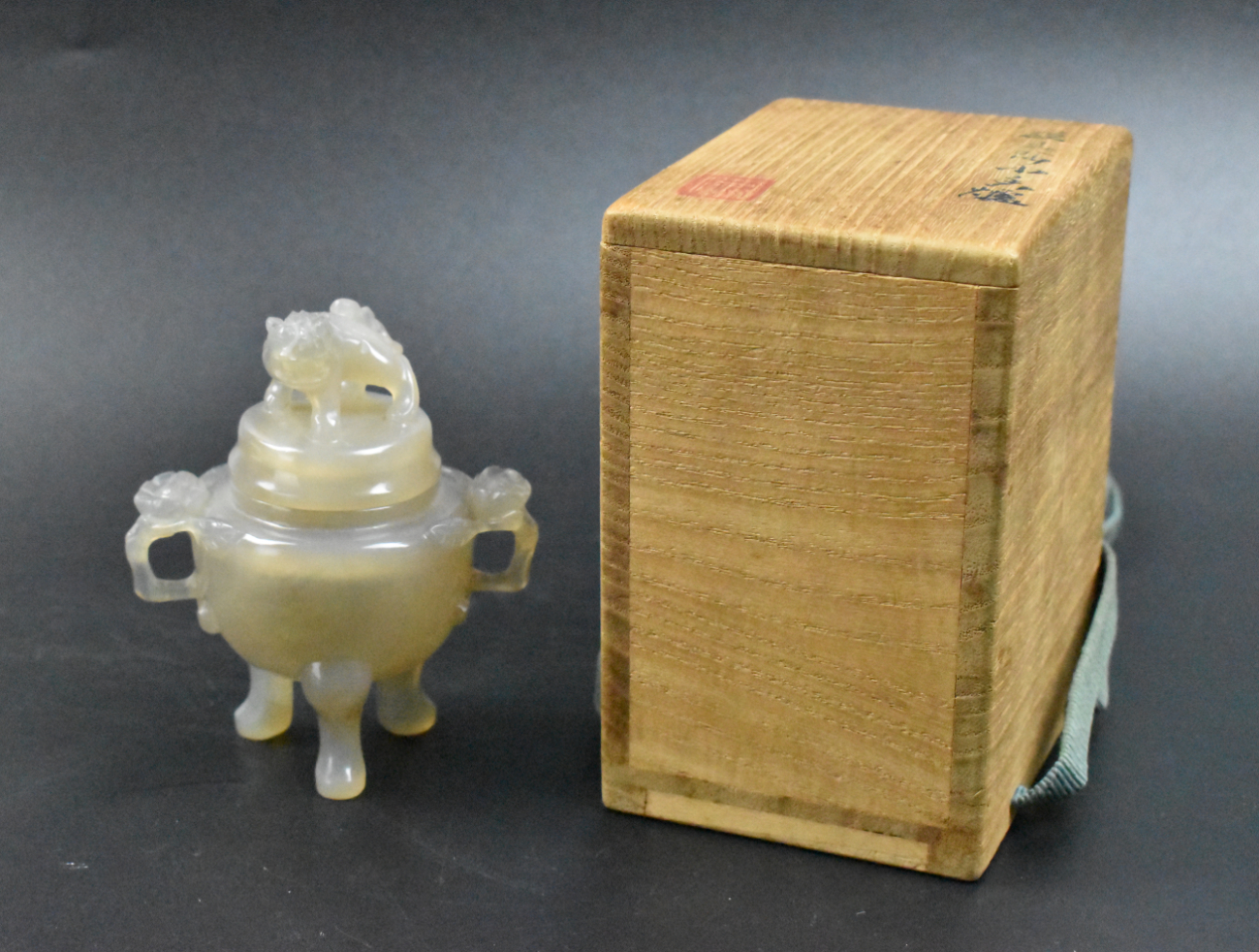 Appraisal: A Chinese agate carved tripod incense burner dating from the