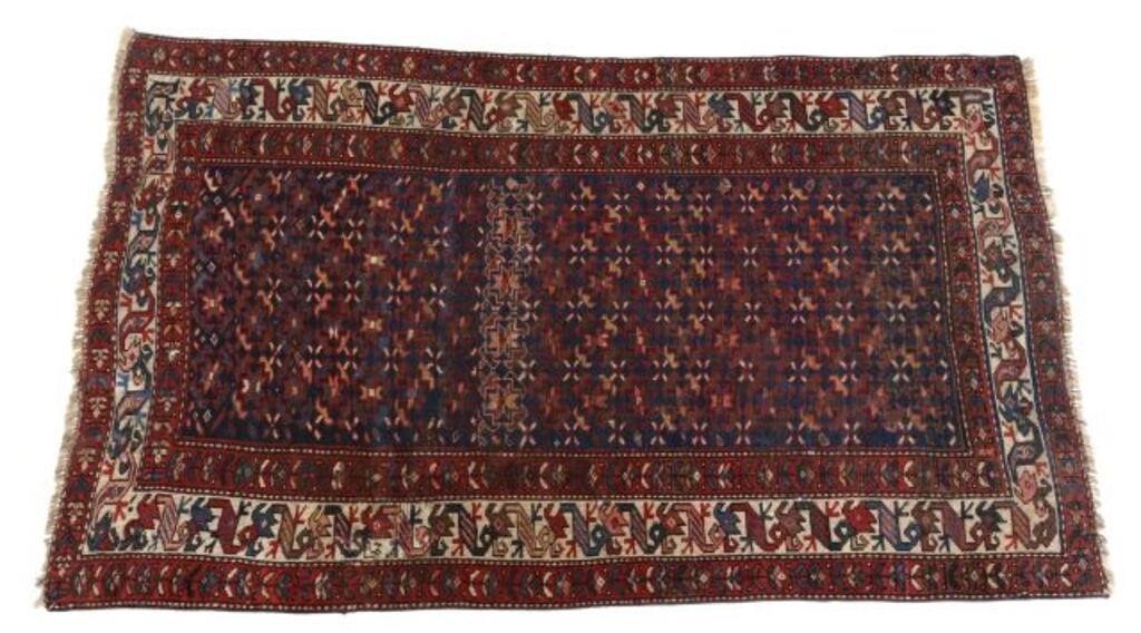 Appraisal: Hand-tied Persian Kurdish rug sewn repair to corner and side