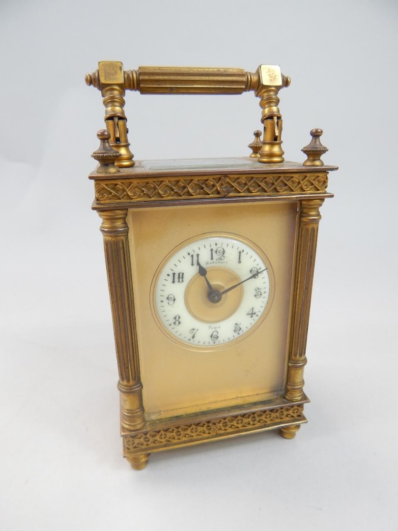 Appraisal: A late thC French gilt brass carriage timepiece with a