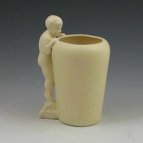 Appraisal: Ivory matte vase with a child looking over the side