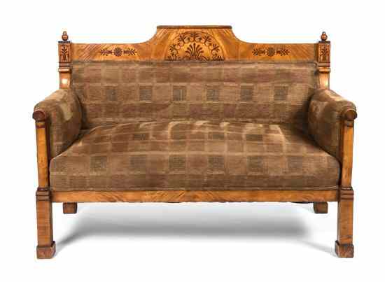 Appraisal: A Biedermeier Satinwood Settee having a straight crest rail with