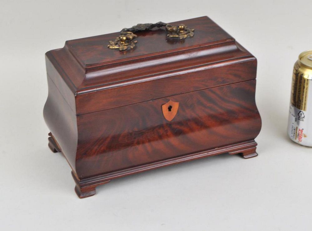 Appraisal: George III Bombe Form Mahogany Tea Caddy with original interior