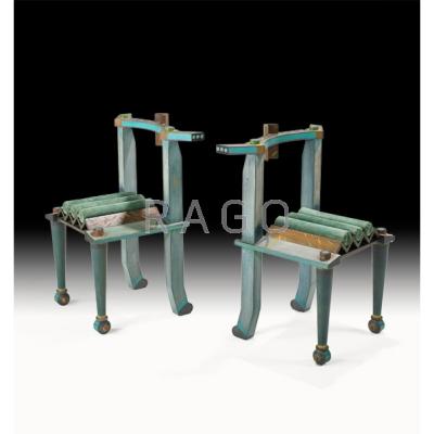 Appraisal: NORMAN PETERSEN Pair of sculptural chairs USA Carved and painted