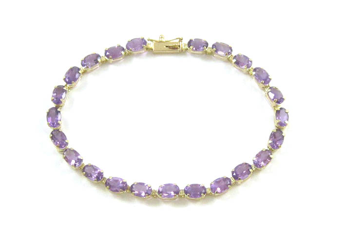 Appraisal: AMETHYST AND FOURTEEN KARAT GOLD BRACELET inches in length set