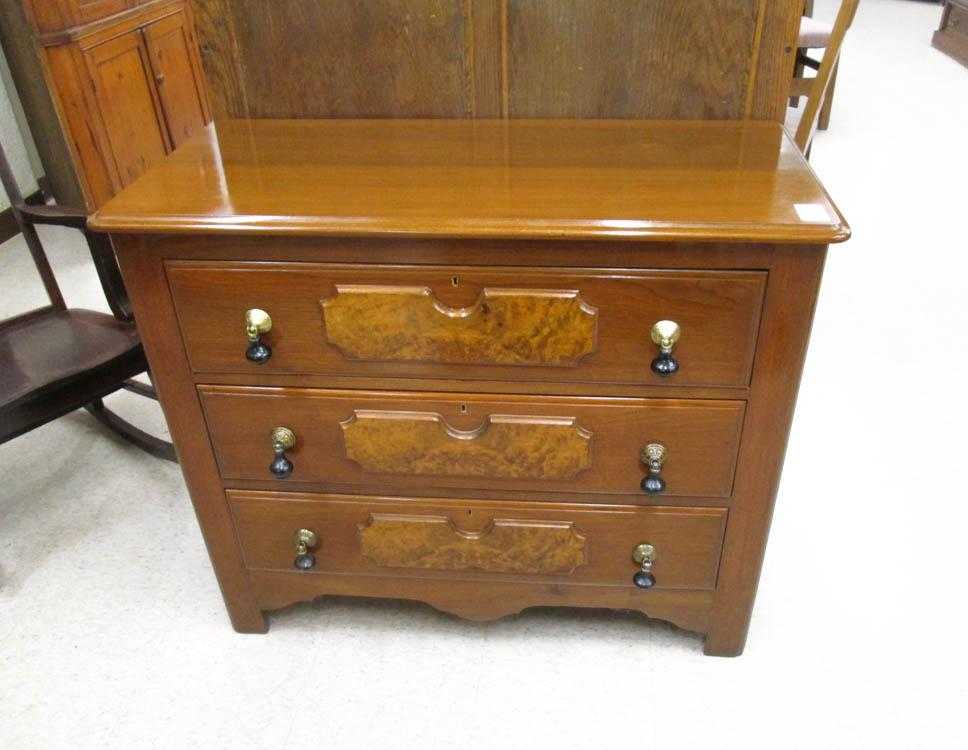 Appraisal: A VICTORIAN WALNUT CHEST OF DRAWERS American last quarter of