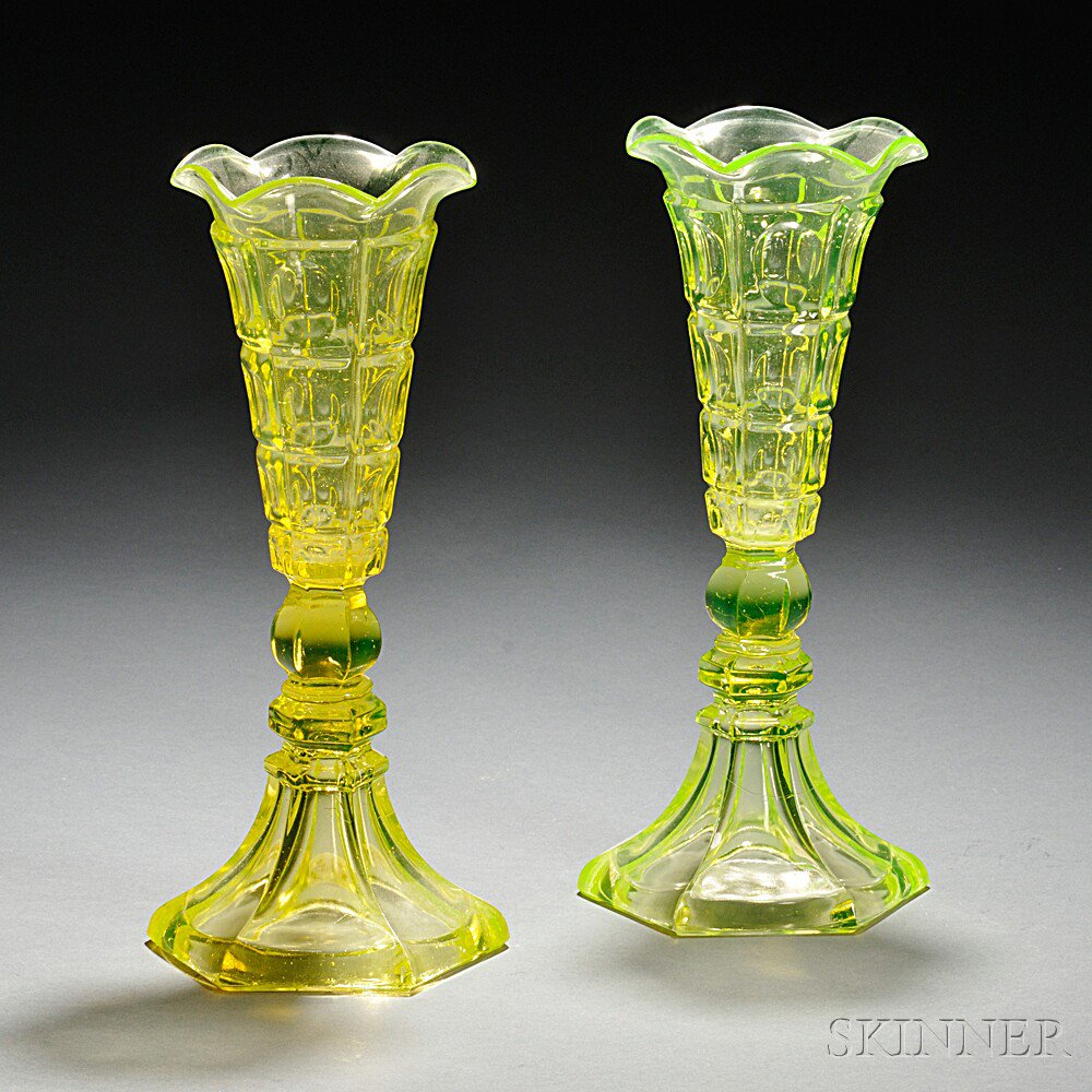 Appraisal: Two Vaseline Pressed Four Printie Block Pattern Glass Vases mid