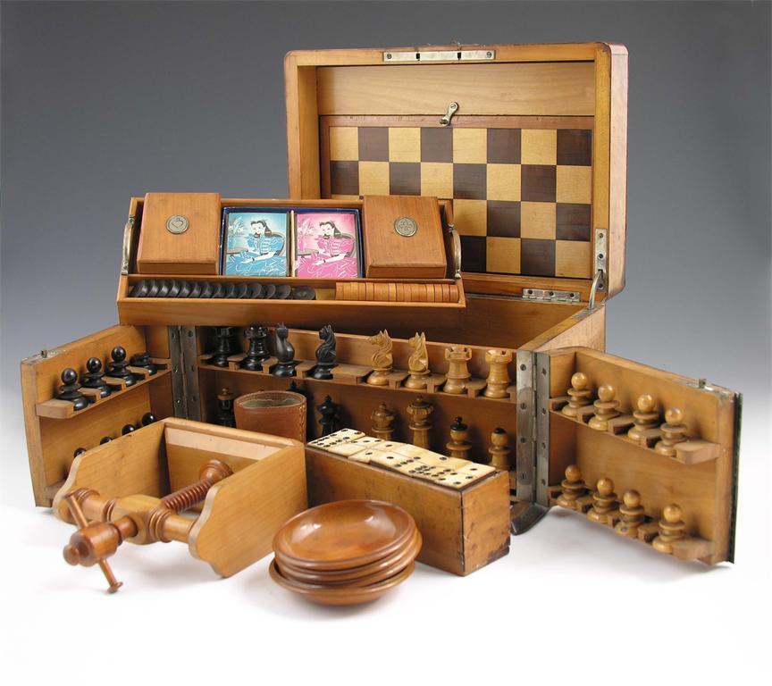 Appraisal: A th century olive wood and brass mounted games compendium