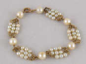 Appraisal: A yellow metal tests carat gold cultured pearl bracelet largest