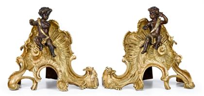 Appraisal: Pair of Louis XV style gilt and patinated bronze chenet